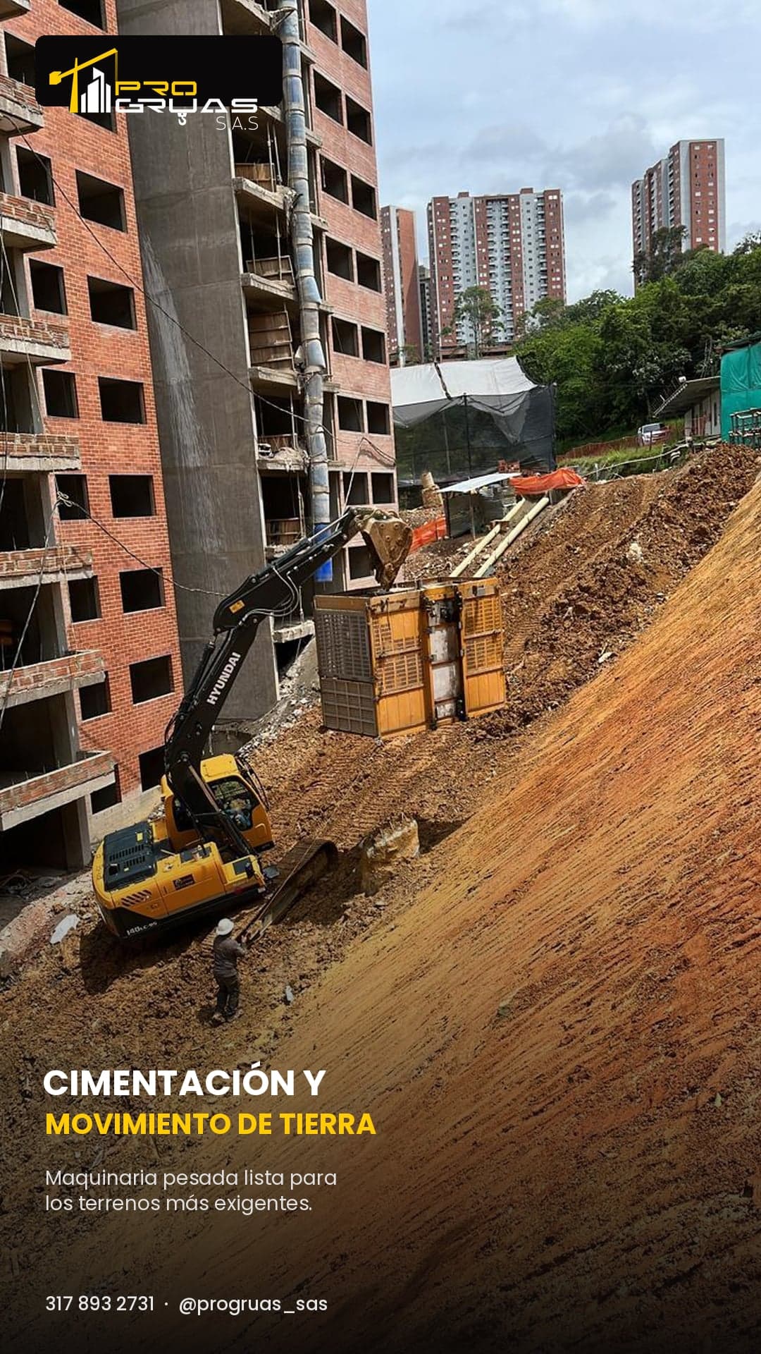 Excavadora Progruas en cimentación y movimiento de tierra junto a un edificio en Medellín